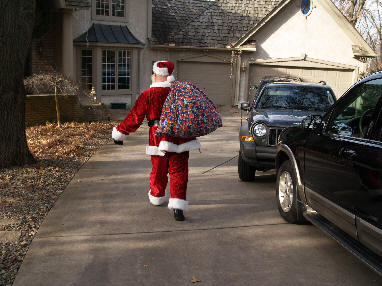 The longer the Minnesota driveway, the more Santa Joe appreciates a warm winter.